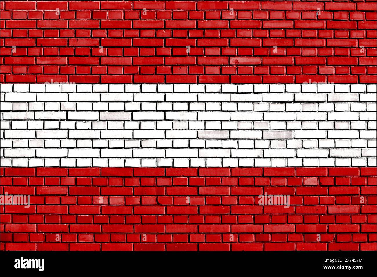 Bandiera dell'Austria dipinta su un muro di mattoni Foto Stock