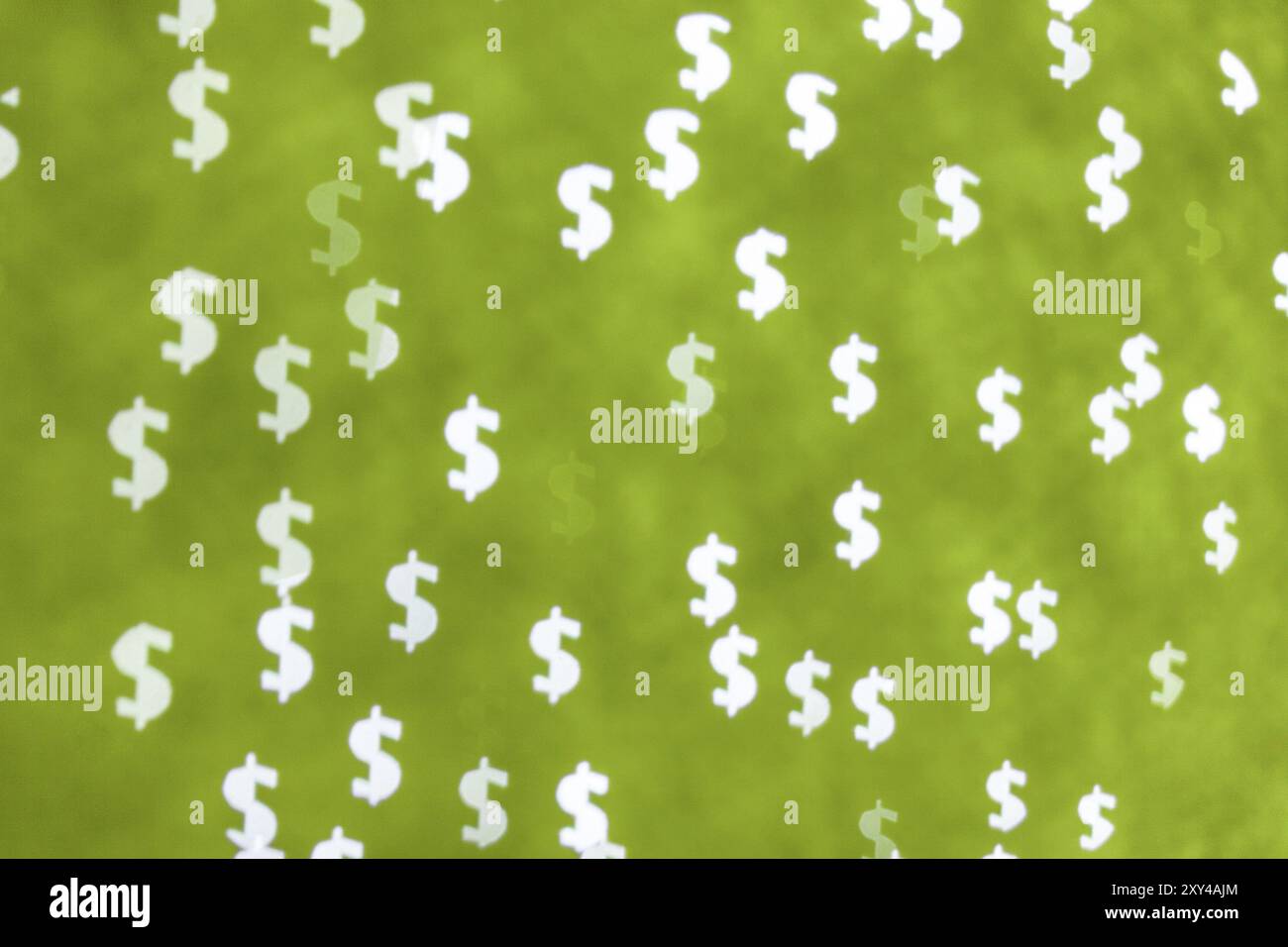 Simbolo del dollaro bokeh verde. La vera foto. Primo piano Foto Stock