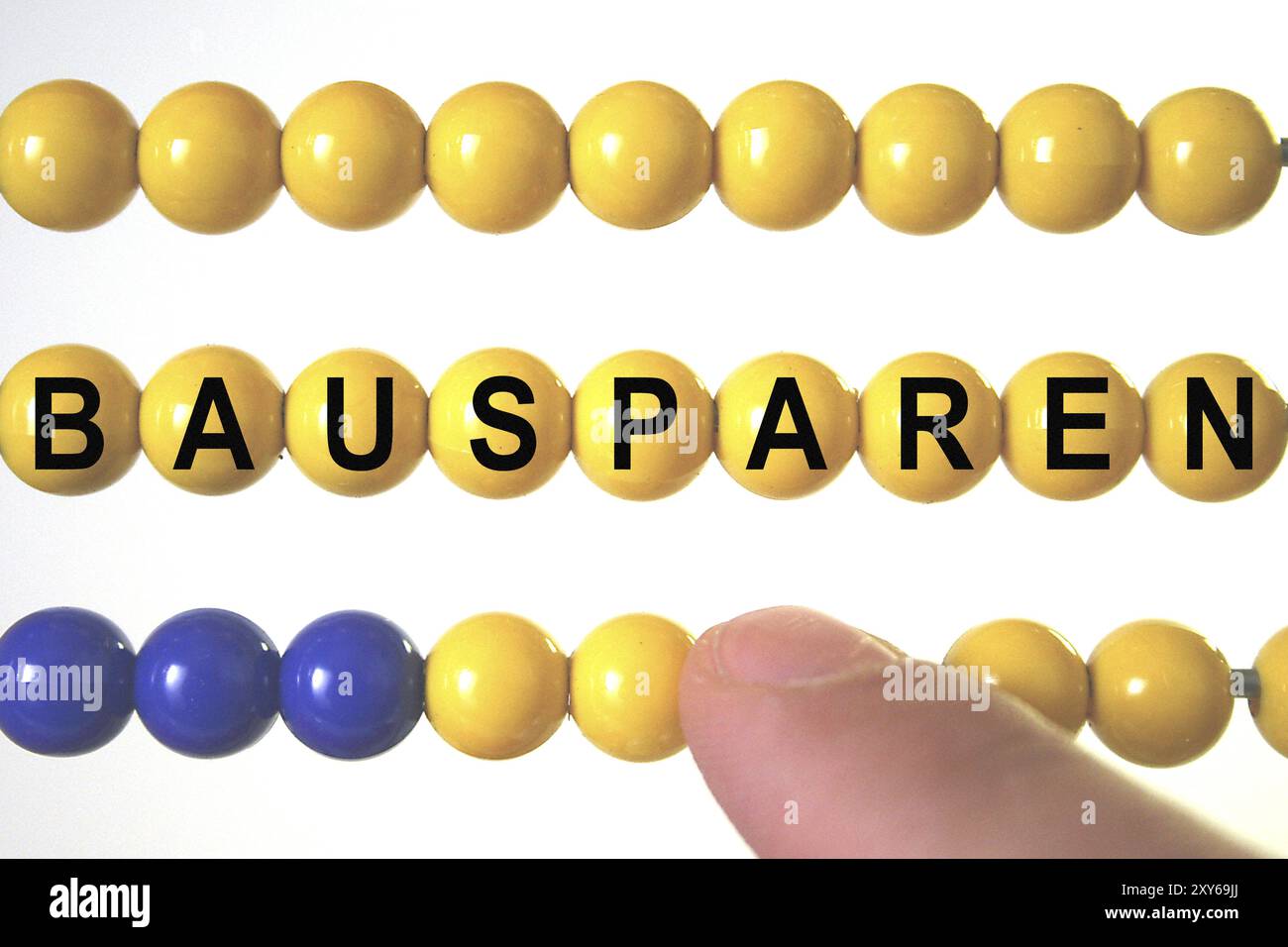 Un abaco con l'iscrizione: Risparmio edilizio, immagini simbolo, studio Foto Stock