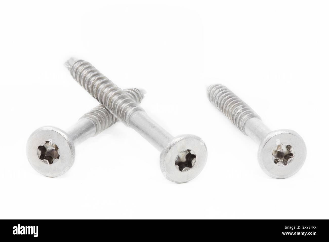 Viti per legno su sfondo bianco Foto Stock