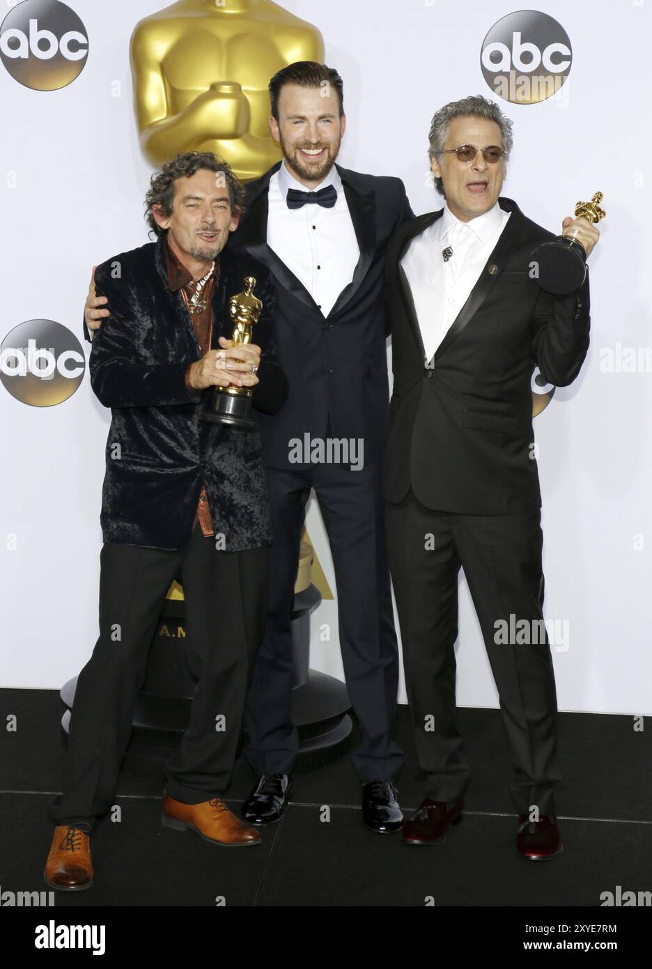 Mark A. Mangini, David White e Chris Evans al 88° Annual Academy Awards, Press Room tenutosi presso il Loews Hollywood Hotel di Hollywood, USA, a febbraio Foto Stock