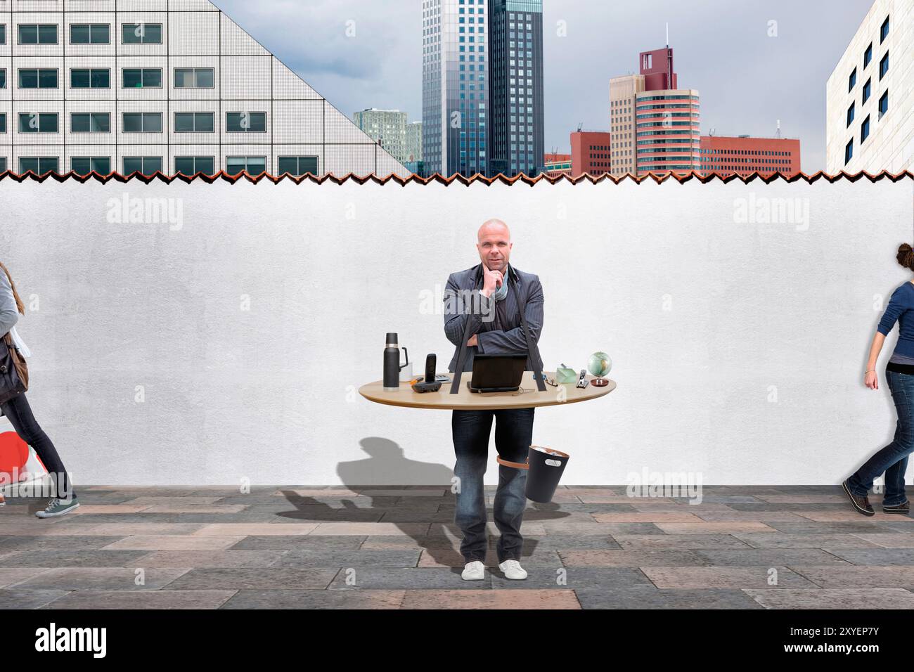 Dipendente con un ambiente di lavoro mobile, immagine simbolica Foto Stock