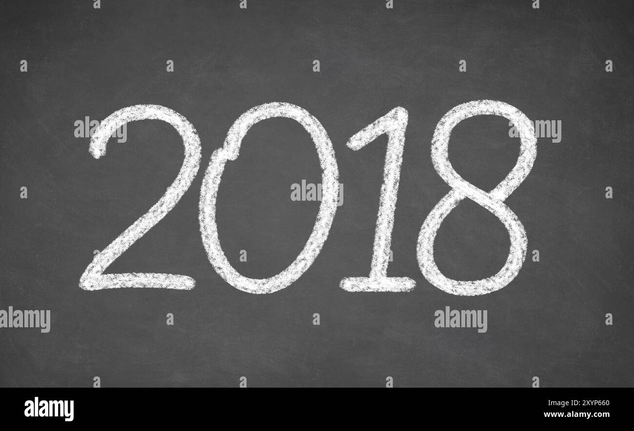 2018, scritto a mano con gesso bianco su una lavagna Foto Stock