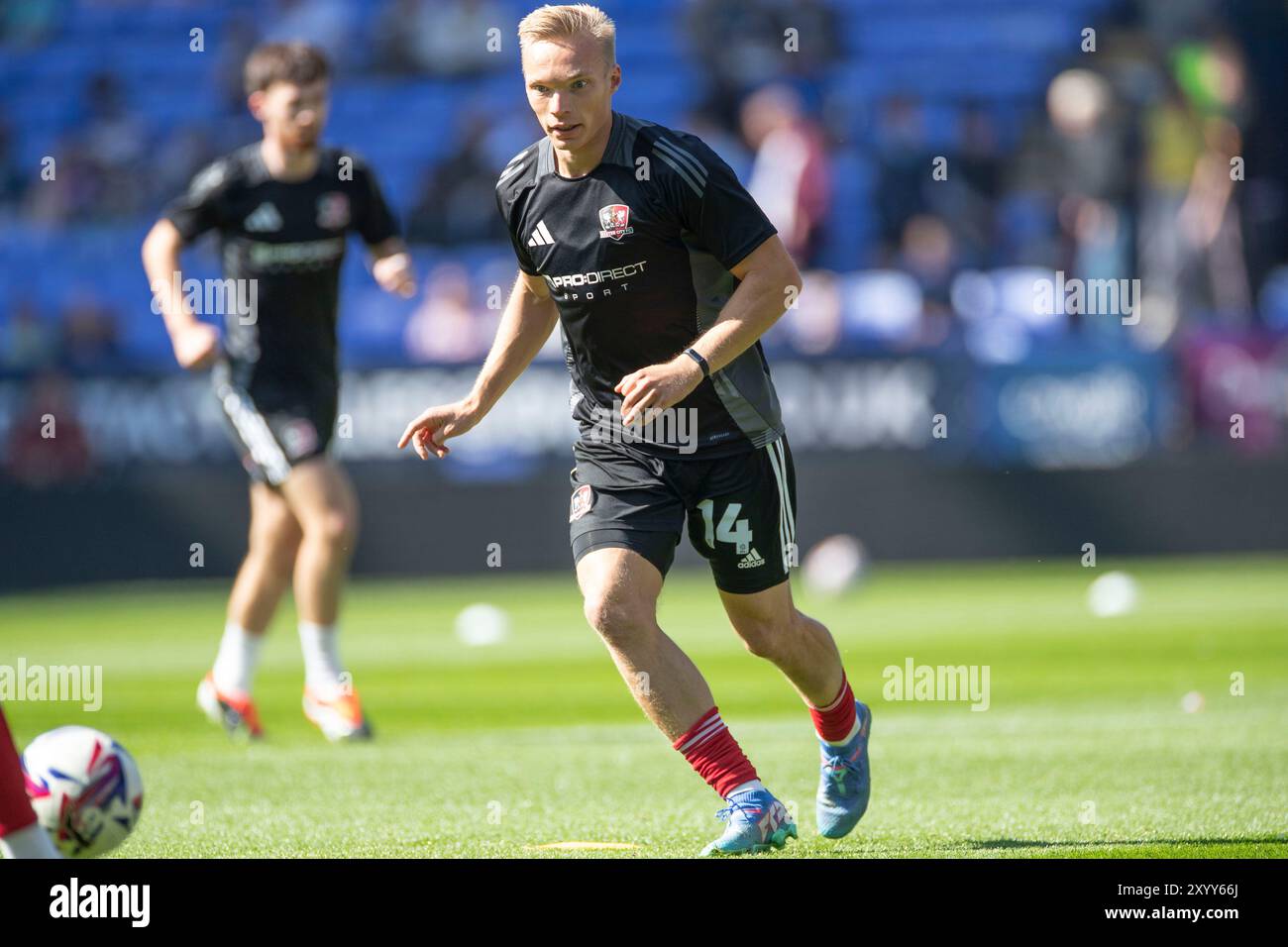 Bolton, Lancashire. REGNO UNITO. 31 agosto 2024. Ilmari Niskanen #14 di Exeter City F.C. si scalda durante la partita di Sky Bet League 1 tra Bolton Wanderers ed Exeter City al Toughsheet Stadium di Bolton, sabato 31 agosto 2024. (Foto: Mike Morese | mi News) crediti: MI News & Sport /Alamy Live News Foto Stock