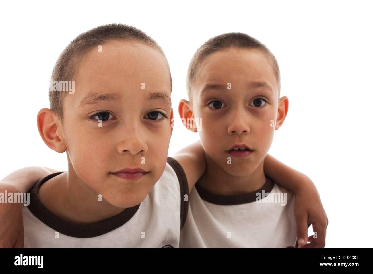 Gemelli isolati su bianco Foto Stock