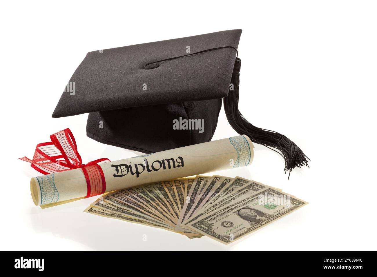 Cappello da medico e banconote da un dollaro, simbolo dei costi di istruzione in America, tasse scolastiche, Vienna, Austria, Europa Foto Stock