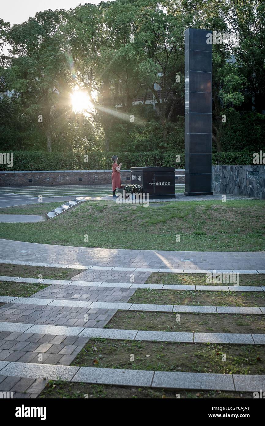 Pregare, punto di detonazione dell'ipocentro della bomba atomica, Hypocenter Park, Nagasaki, Giappone. Foto Stock