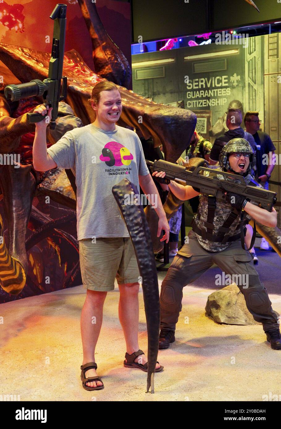 Stand of Starship Troopers Extermination, gioco di guerra di Offworld Industries, fiera Gamescom, Colonia, Germania, Europa Foto Stock