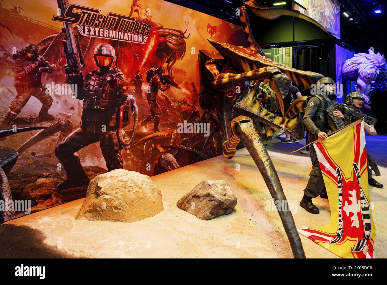 Stand of Starship Troopers Extermination, gioco di guerra di Offworld Industries, fiera Gamescom, Colonia, Germania, Europa Foto Stock