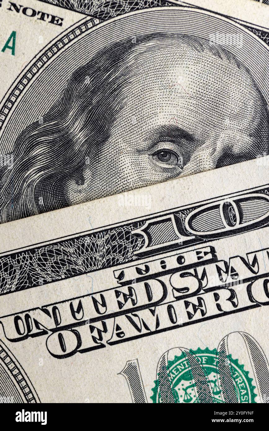 Diversi americani cento dollari fatture primo piano, dettagli di carta dollari americani in contanti Foto Stock