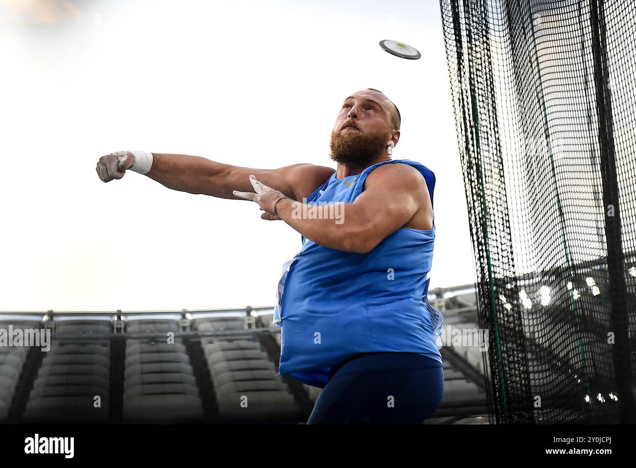 Alessio Mannucci d'Italia gareggia nel lancio del disco maschile durante il meeting di atletica leggera Diamond League a Roma, 30 agosto 2024. Kristjan CEH si è piazzato al primo posto. Foto Stock