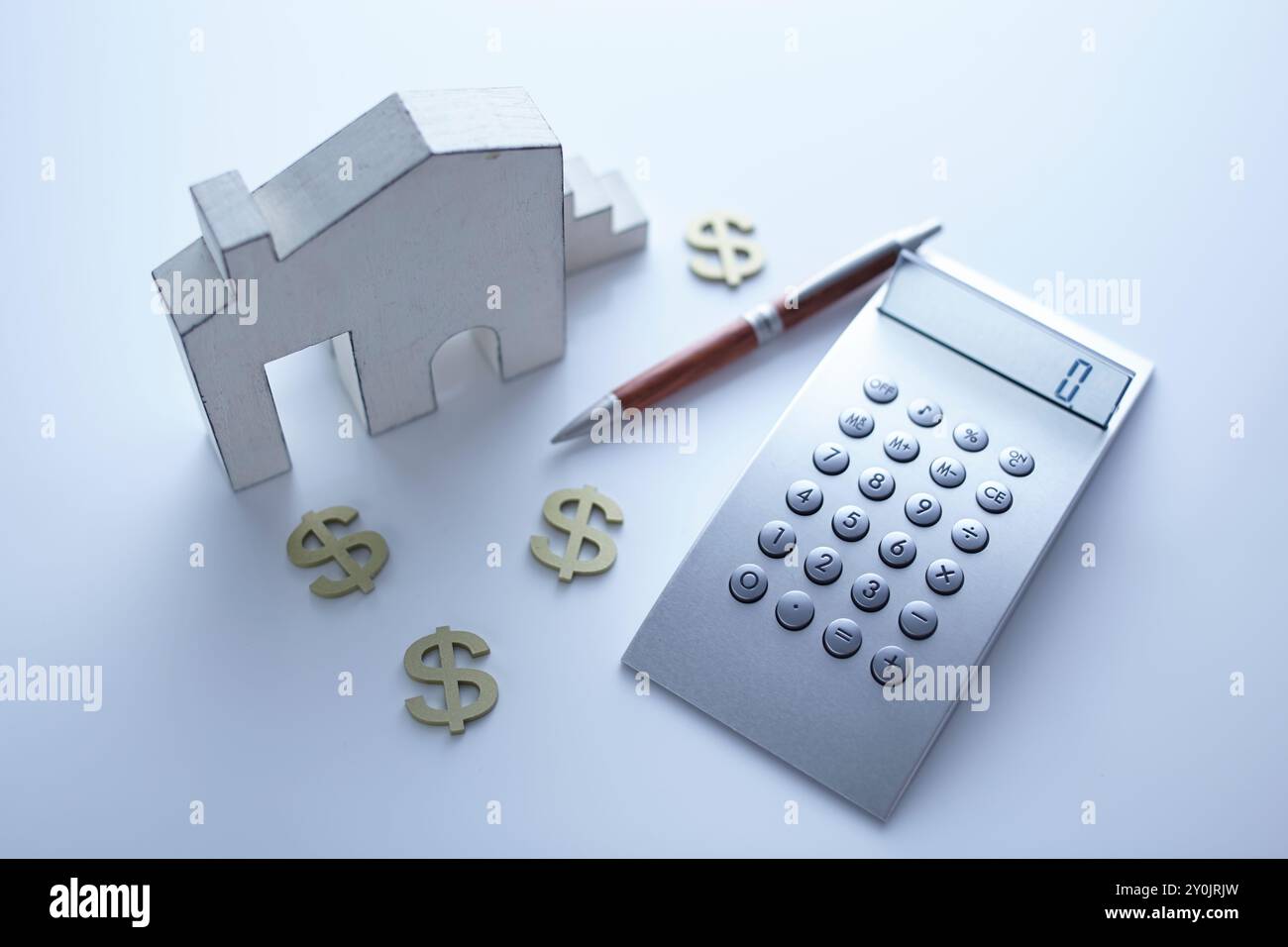 l'immagine commerciale della calcolatrice e della casa Foto Stock