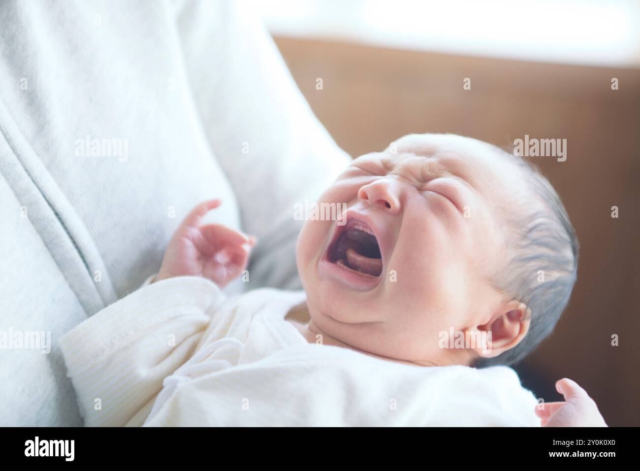 Pianto di neonato Foto Stock