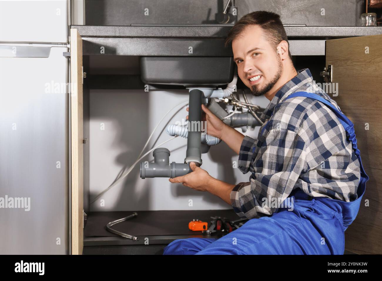 Sistema di tubazioni per idraulici professionale a casa Foto Stock