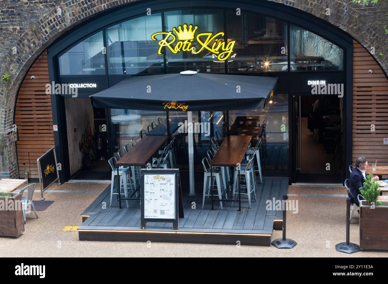 Roti King, ristorante malese e singaporiano, 16 Arches Lane, Battersea Power Station, Londra, Regno Unito Foto Stock