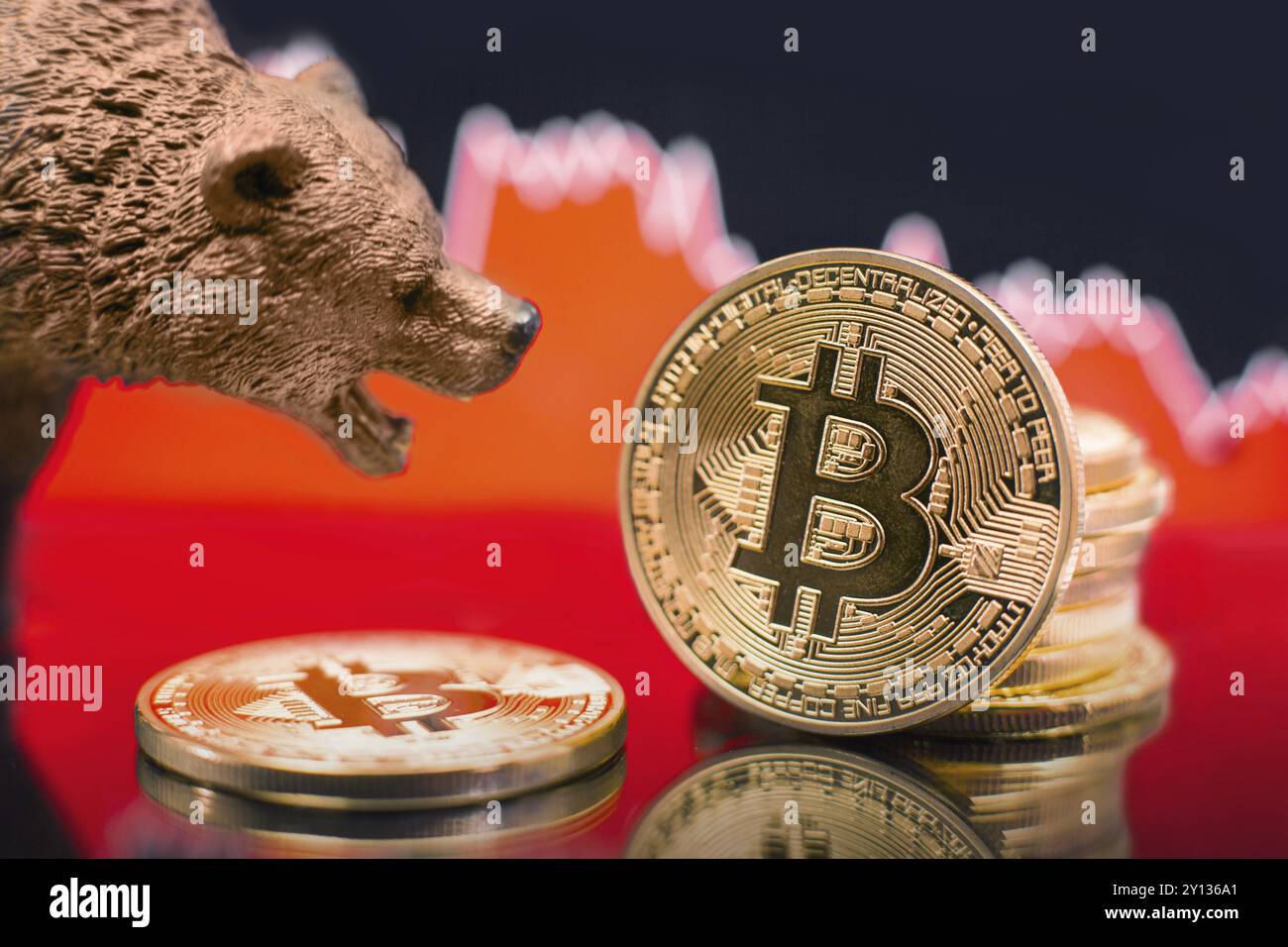 Bitcoin con un grafico rosso. Il crollo dei prezzi e il concetto di tendenza del mercato Foto Stock