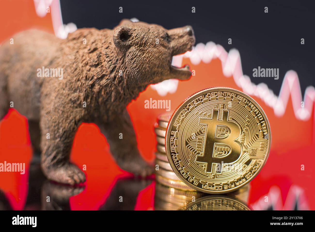Bitcoin con un grafico rosso. Il crollo dei prezzi e il concetto di tendenza del mercato Foto Stock