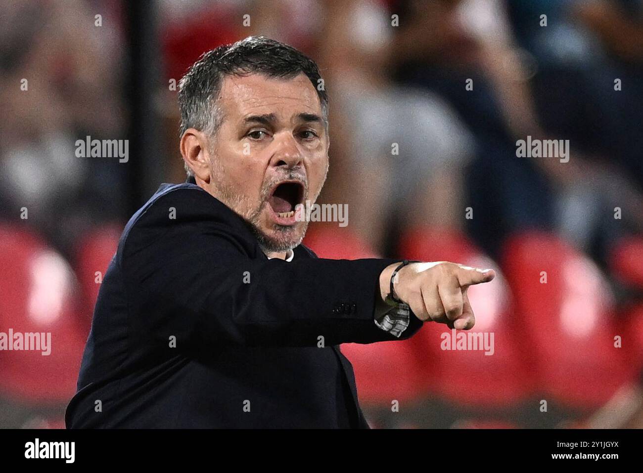 Georgia's head coach Willy Sagnol directs his players during the UEFA Nations League soccer match between Georgia and Czech Republic at the Mikheil Meskhi stadium in Tbilisi, Georgia, Saturday, Sept. 7, 2024. (AP Photo/Tamuna Kulumbegashvili) Foto Stock