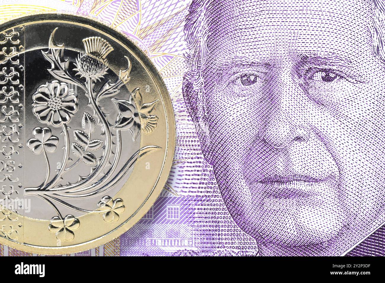 Charles III curency britannico - banconote da 20 sterline e monete da 2 sterline Foto Stock