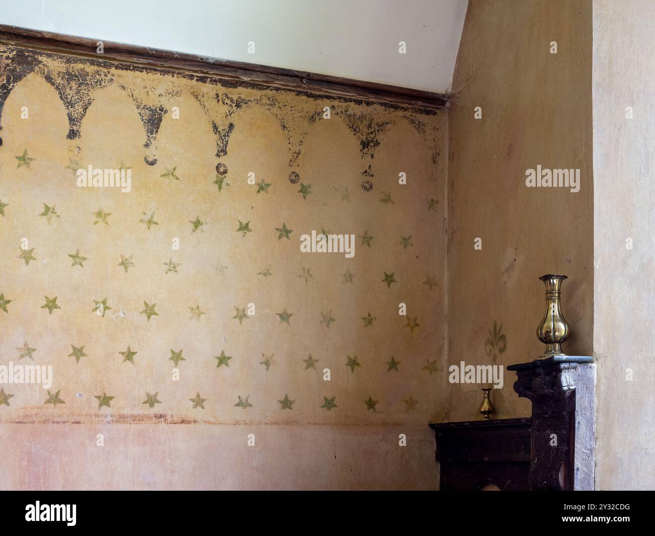 Decorazioni murali originali a pietra all'interno della chiesa di San Giovanni Battista, Plumpton, Northamptonshire, Regno Unito Foto Stock