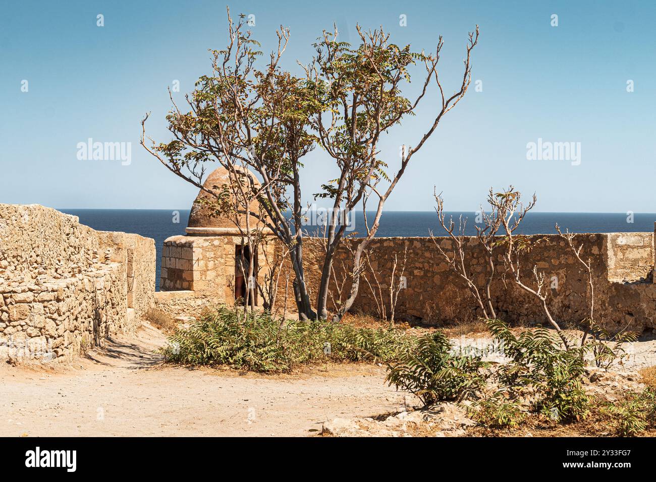 Fortezza Veneziana a Rethymno, isola di Creta, Grecia. Torre difensiva nel muro della fortezza Foto Stock