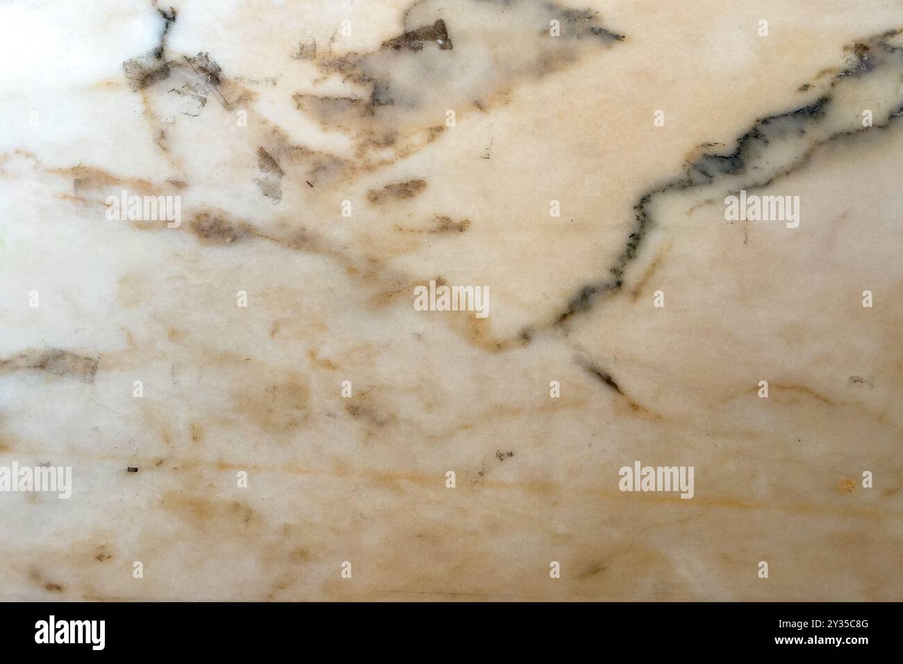 Una splendida superficie in marmo mette in risalto splendidi motivi naturali di tonalità beige e grigie, ideale per progetti di interior design creativi e spazi eleganti Foto Stock
