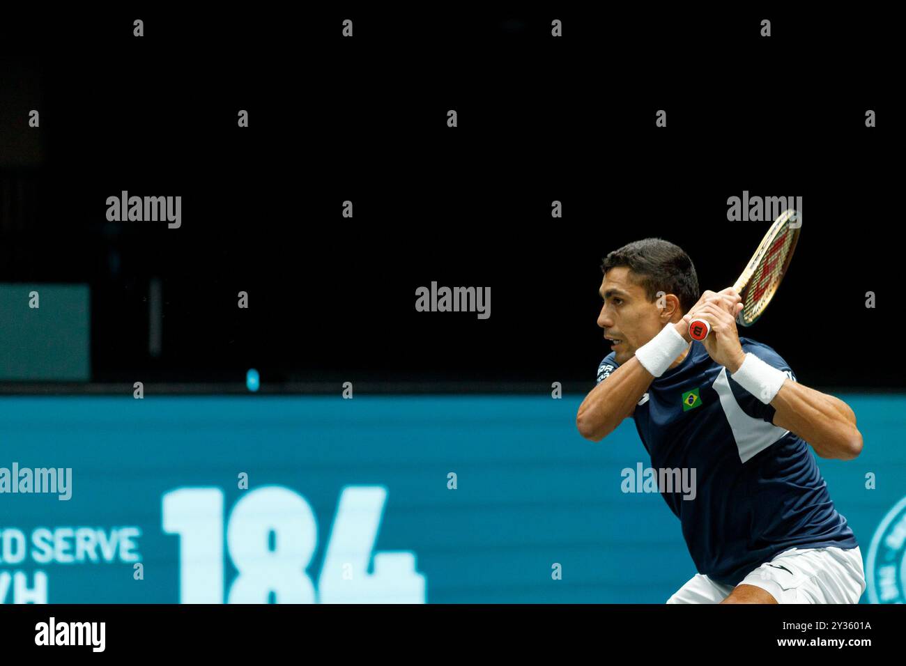 Bologna, Italia. 12 settembre 2024. Thiago Monteiro del Brasile in azione contro Tallon Griekspoor dei Paesi Bassi durante la partita a gironi delle finali di Coppa Davis 2024 di Bologna tra Paesi Bassi e Brasile all'Unipol Arena il 12 settembre 2024 a Bologna, Italia. Crediti: Massimiliano Donati/Alamy Live News Foto Stock