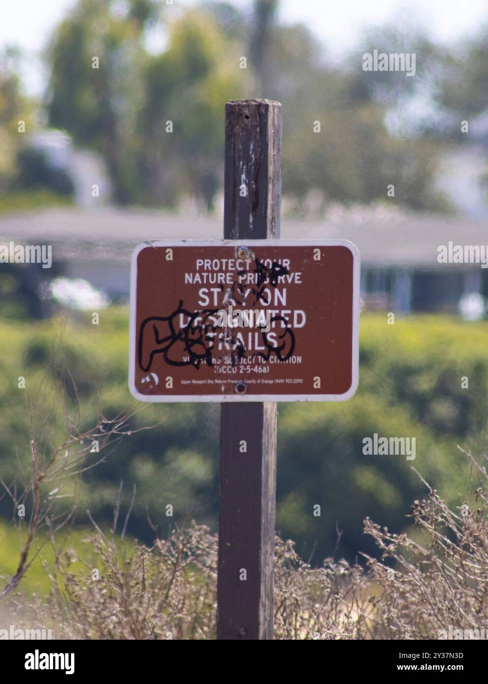 Cartello "Habitat Restoration area Do Not Enter" (area ripristino habitat non entrare Foto Stock