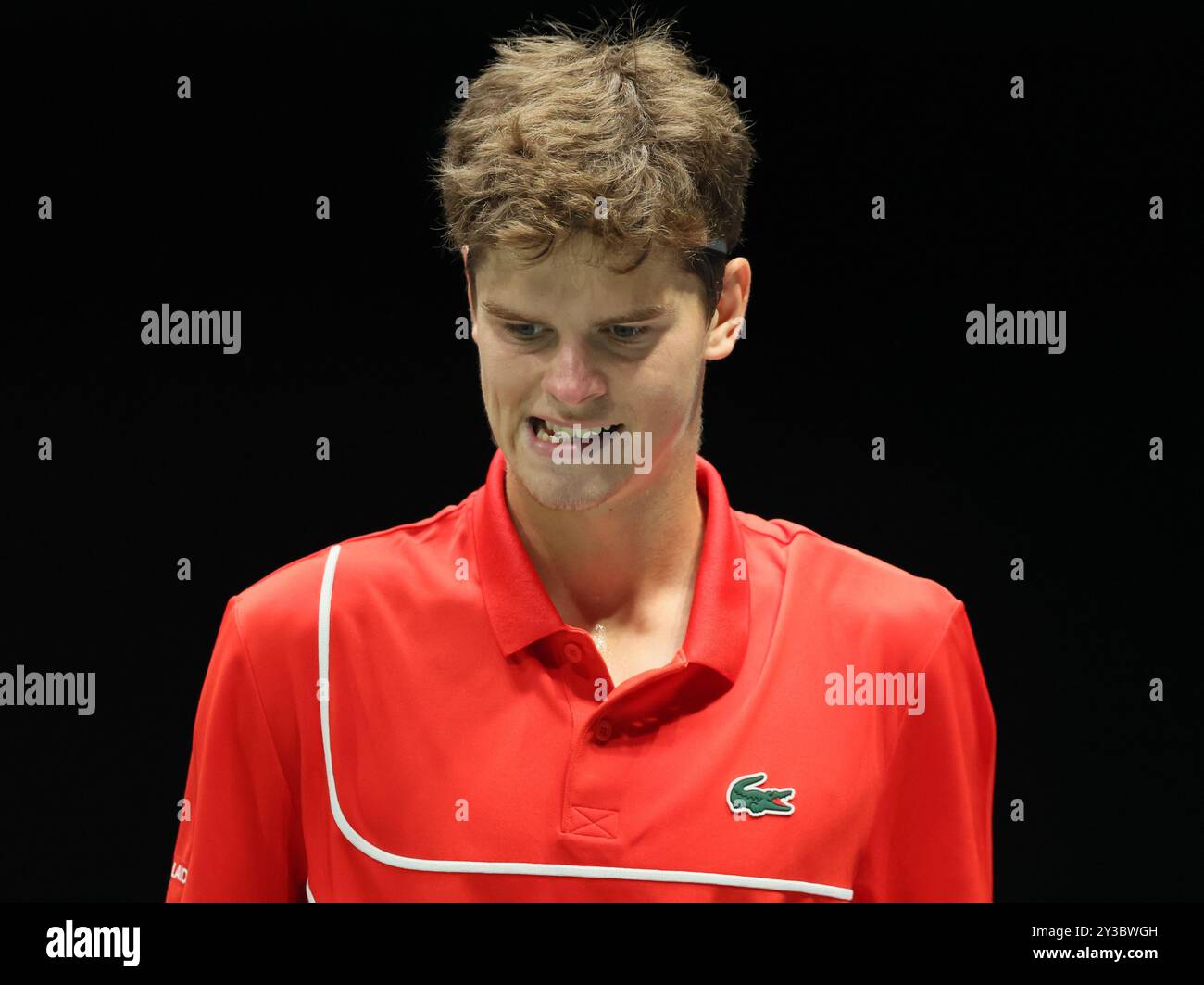 Bologna, Italia. 13 settembre 2024. Il belga Alexander Blockx reagisce durante una partita tra l'italiano Berrettini e il belga Blockx, la prima partita nel girone A delle finali di Coppa Davis tra Italia e Belgio, venerdì 13 settembre 2024, all'Unipol Arena di Bologna. BELGA PHOTO BENOIT DOPPAGNE credito: Belga News Agency/Alamy Live News Foto Stock