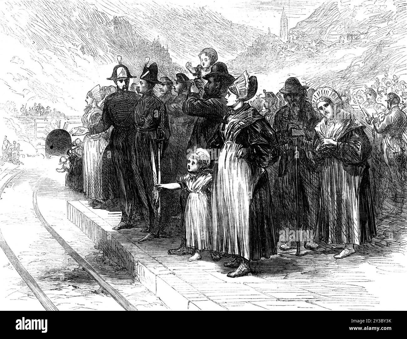 Apertura del tunnel del Mont Cenis: Gente di campagna in attesa di vedere il pass ferroviario, 1871. Tunnel ferroviario - 3,7 km (8,5 miglia) di lunghezza - nelle Alpi europee, che collega Bardonecchia in Italia a Modane in Francia. Il tunnel...from Modane, in Savoia, a Bardonn&#xe9;che, in Piemonte, annoiato per sette miglia e mezzo di spessore di montagna,...dalla scienza e dalle competenze degli ingegneri nativi e dal lavoro degli operai nativi, dal 1857, fu ufficialmente aperto la domenica settimana...il primo treno speciale, alle dieci e mezza, trasportava i Ministri di Stato italiani, il Sindaco o Sindaco di Torino, e altri Foto Stock
