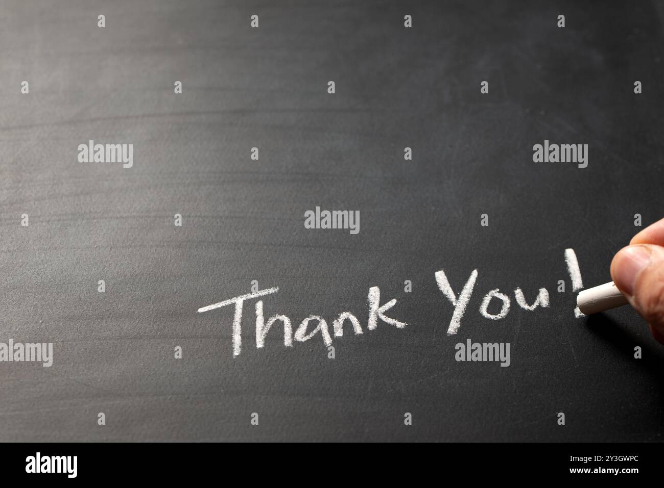 Scrittura a mano Grazie parola sulla lavagna Foto Stock