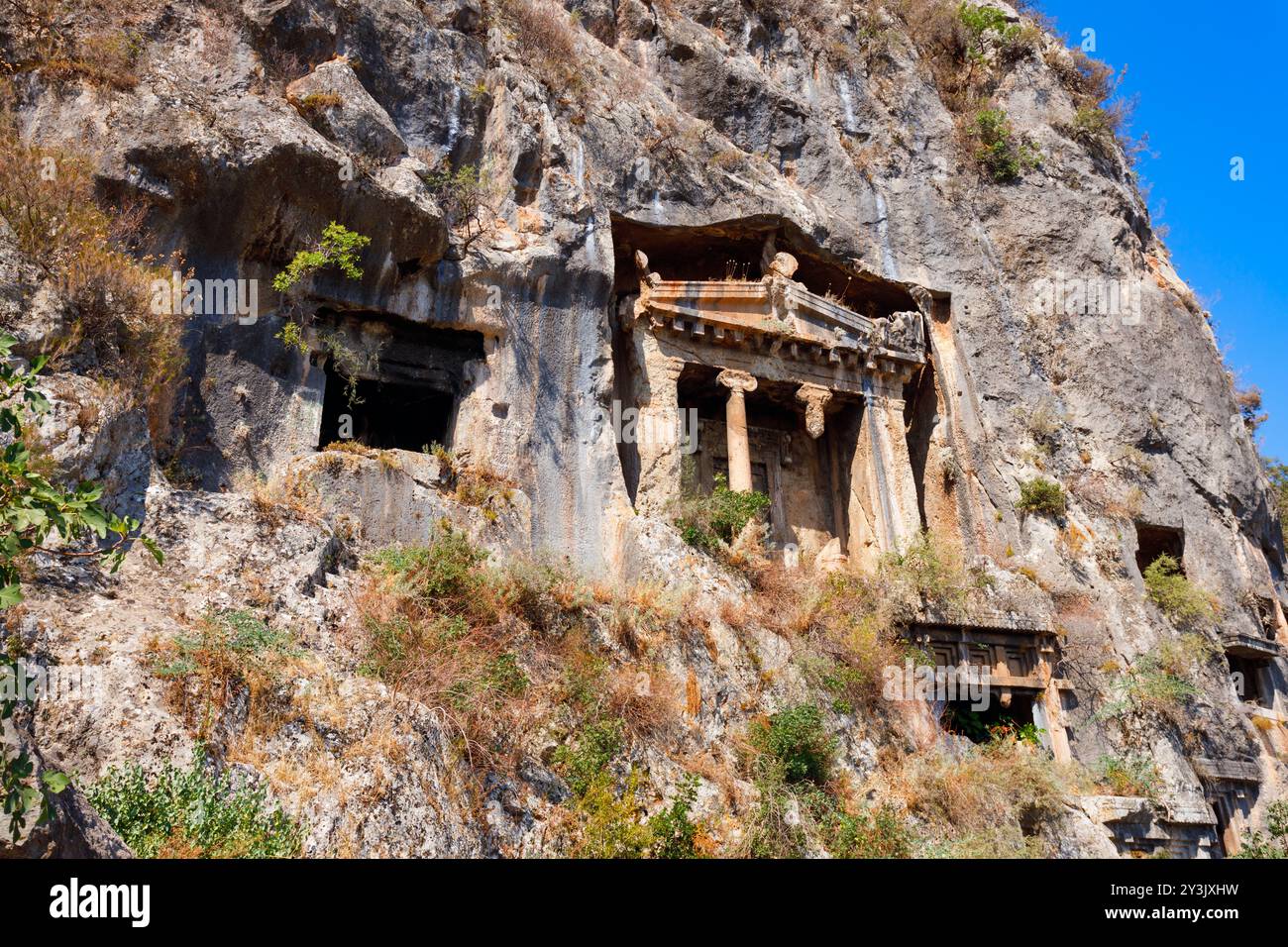 La Tomba di Amyntas o Tomba di Fethiye è un'antica tomba di roccia Licia nell'antica Telmessos, in Licia. Ora si trova nella città di Fethiye, nella provincia di Mugla, in Turchia. Foto Stock
