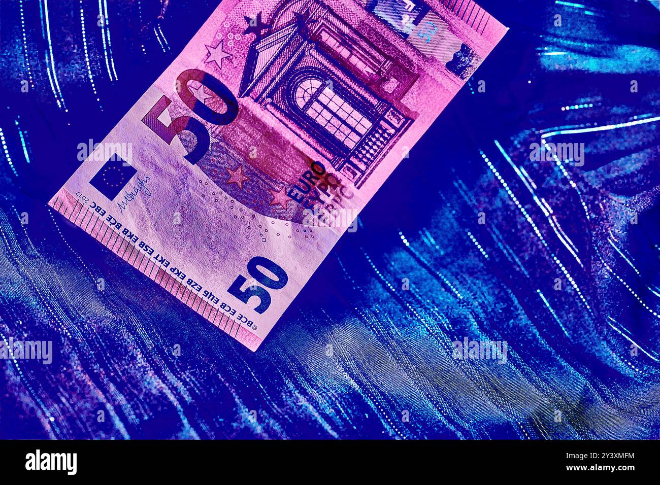 un mezzo di scambio corrente sotto forma di monete e banconote Foto Stock