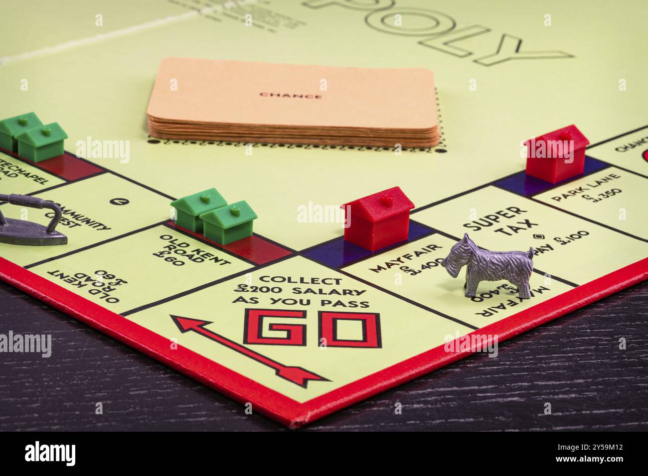 Passare andare su un consiglio di monopolio Foto Stock
