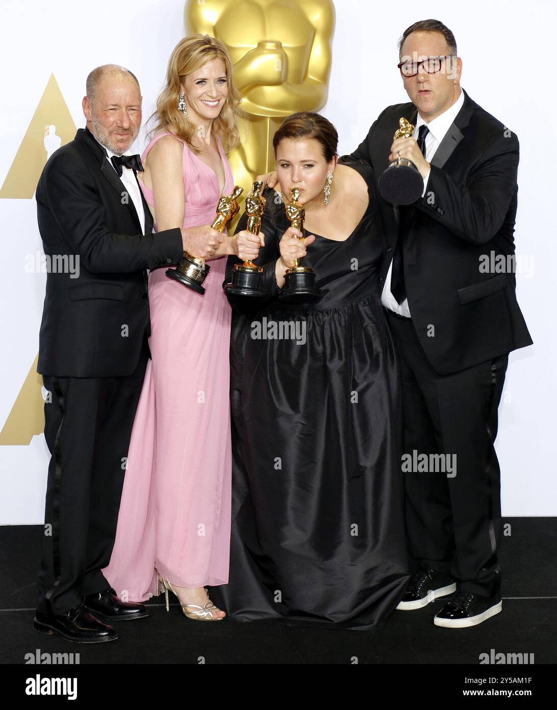 Steve Golin, Blye Pagon Faust, Nicole Rocklin e Michael Sugar al 88° Annual Academy Awards - Press Room tenutosi al Loews Hollywood Hotel di Hollywood, USA il 28 febbraio 2016. Foto Stock