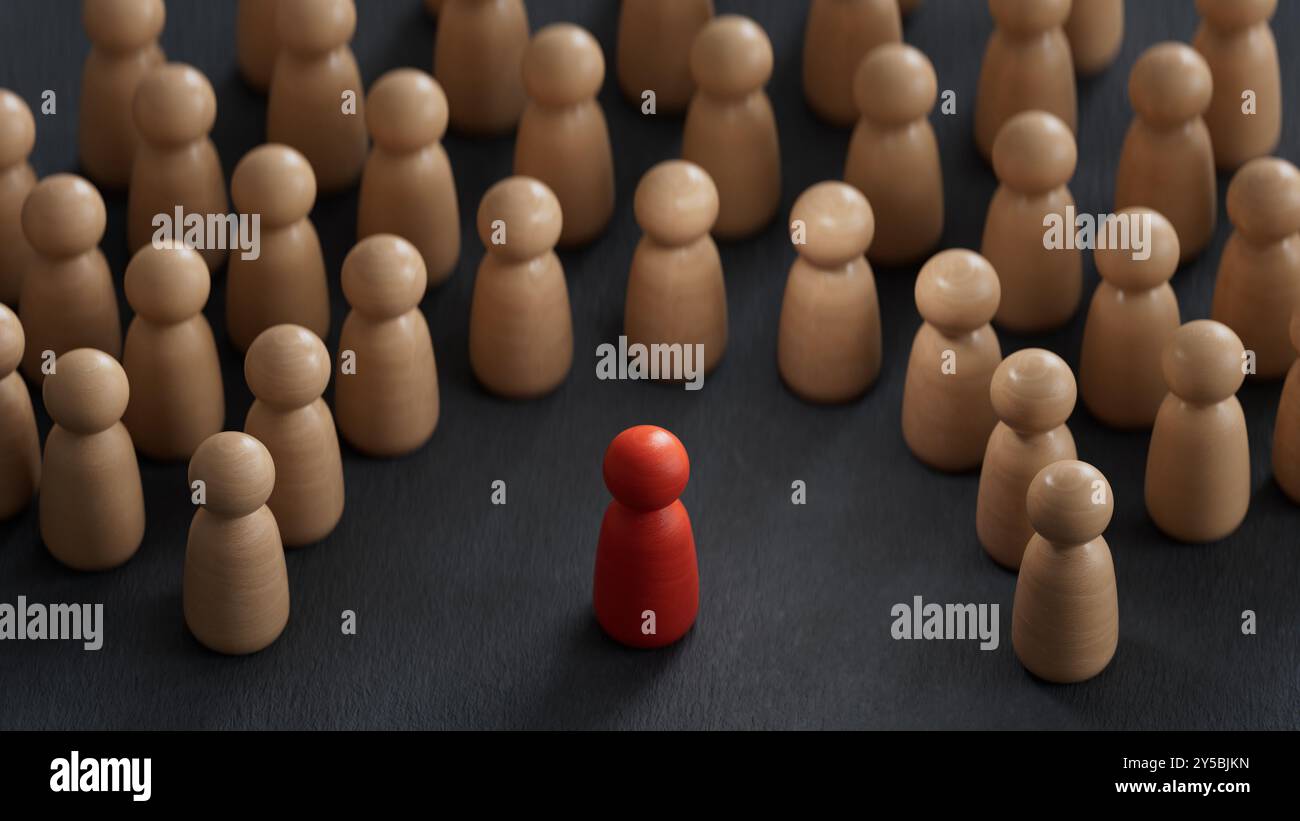 Concetto di discriminazione e inclusione. Le statuette in legno circondavano il rendering rosso.3D su sfondo nero. Foto Stock