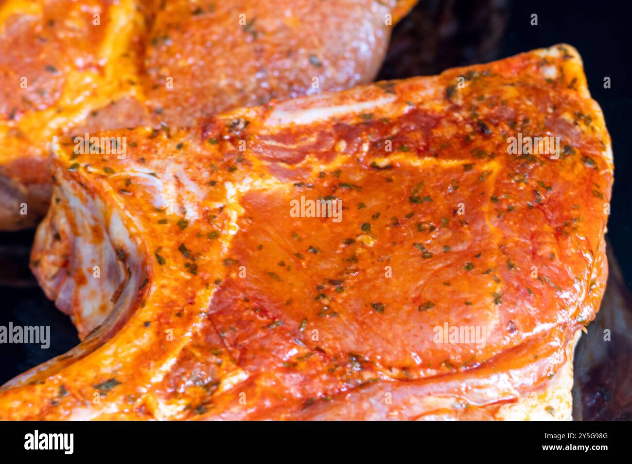 Primo piano di bistecca marinata Foto Stock