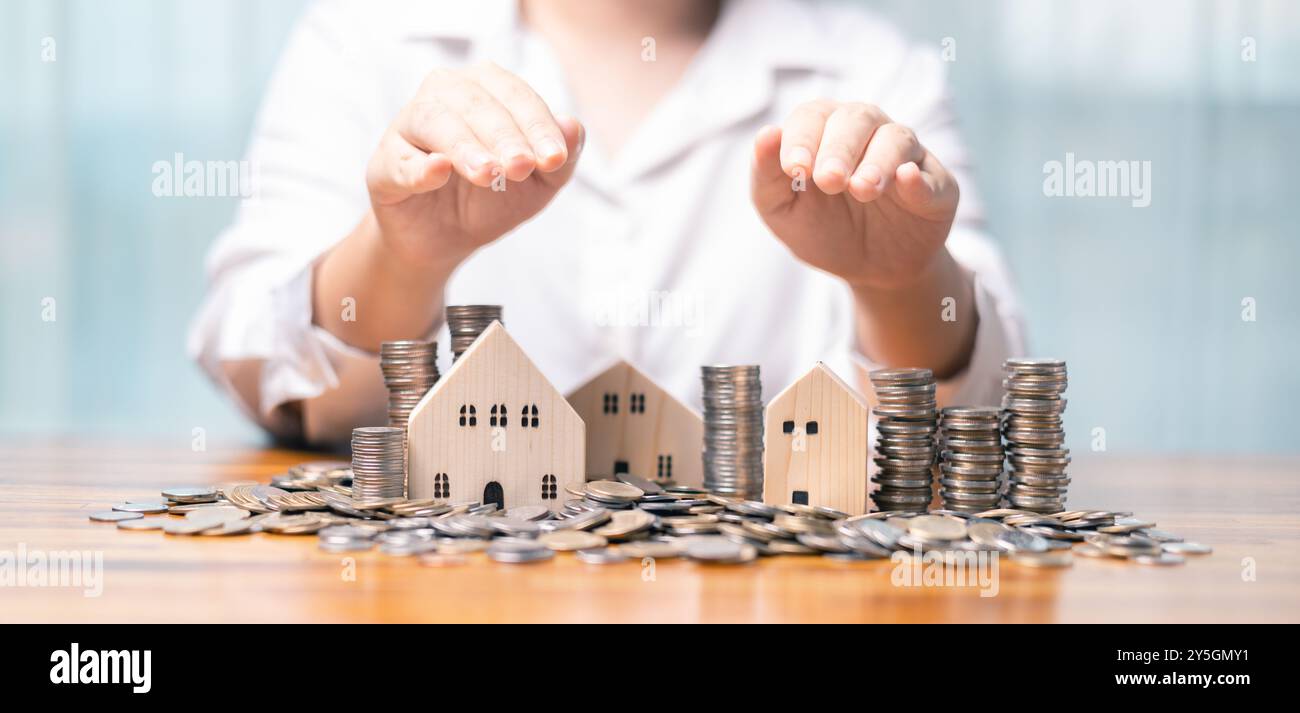 L'assicurazione fornisce protezione e sicurezza per il vostro investimento immobiliare, specialmente quando finanziate un mutuo ipotecario per la vostra proprietà. assicurazione, protec Foto Stock