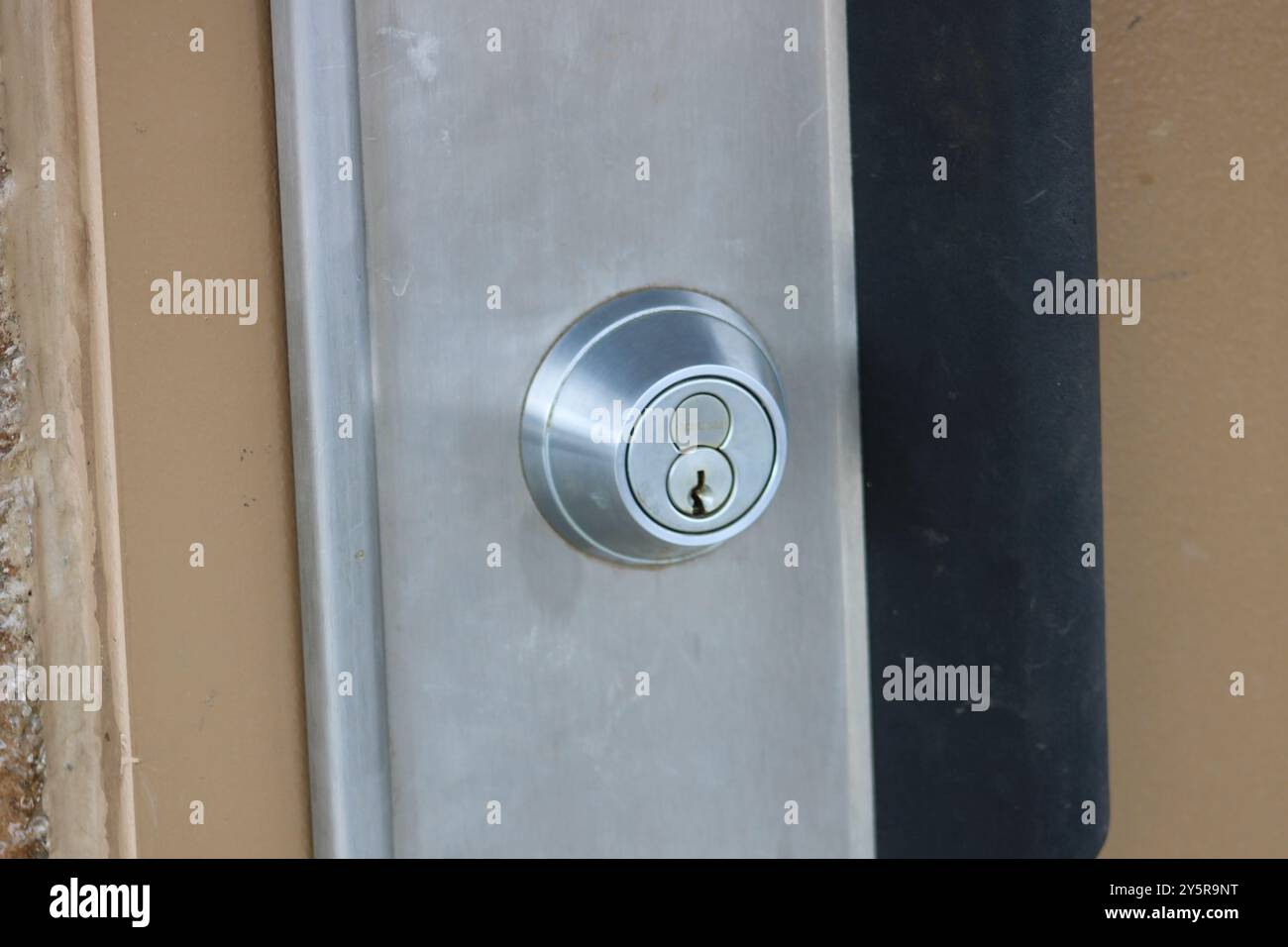 serratura rotonda argento con foro per chiavetta Foto Stock
