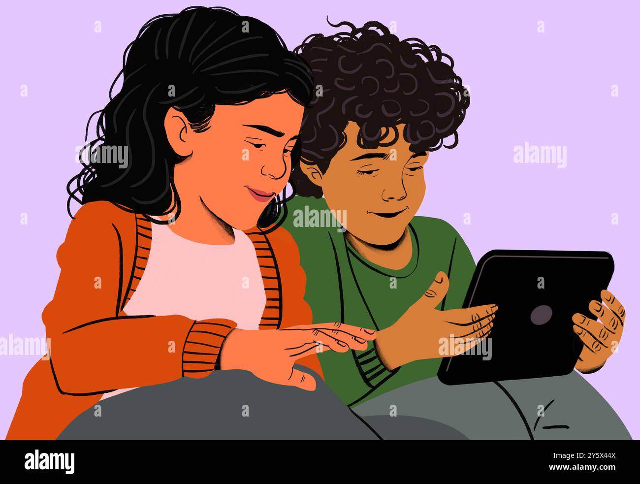 Due bambini seduti seduti insieme sullo schermo di un tablet. Foto Stock