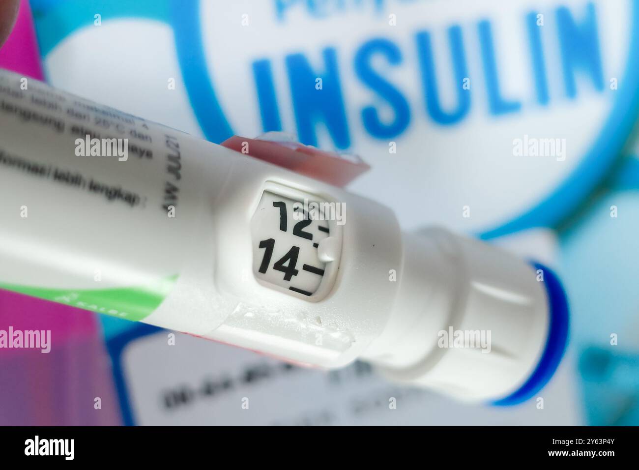 Iniezione di insulina a penna che mostra la quantità di dosaggio Foto Stock