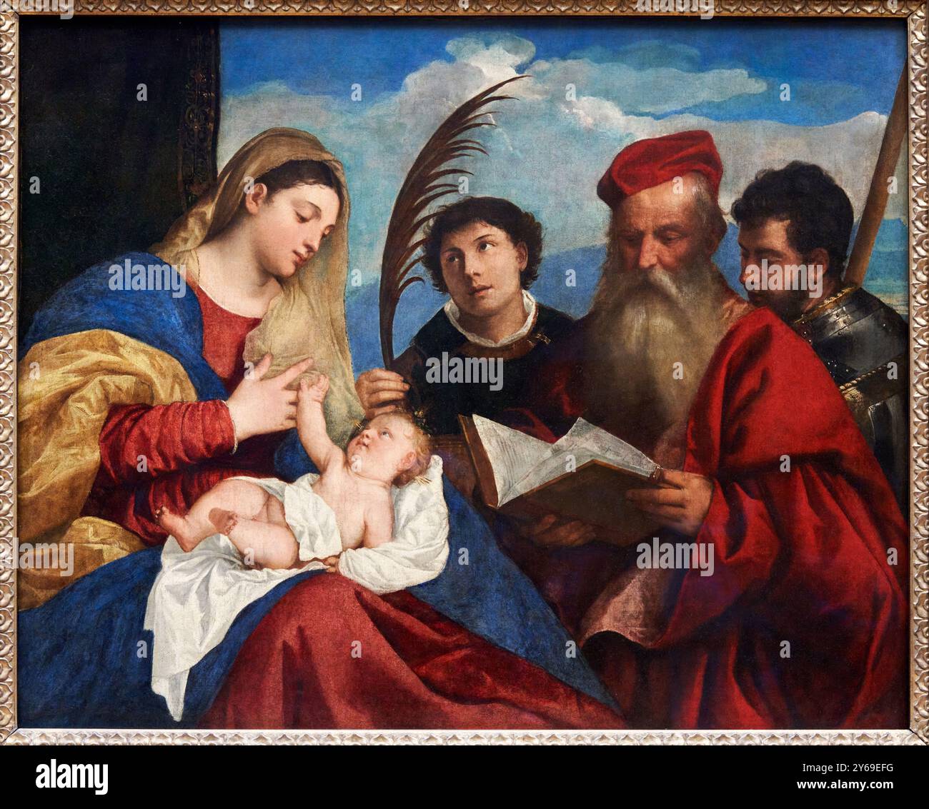 La Vergine con il bambino con Santo Stefano, San Girolamo e San Maurizio, olio su tela, circa 1515-1520, Tiziano Vecellio, dit TITIEN, Pieve di Cadore (Vénétie), vers 1488-1490 - Venise, 1576, Musée du Louvre, Parigi, Francia. Foto Stock