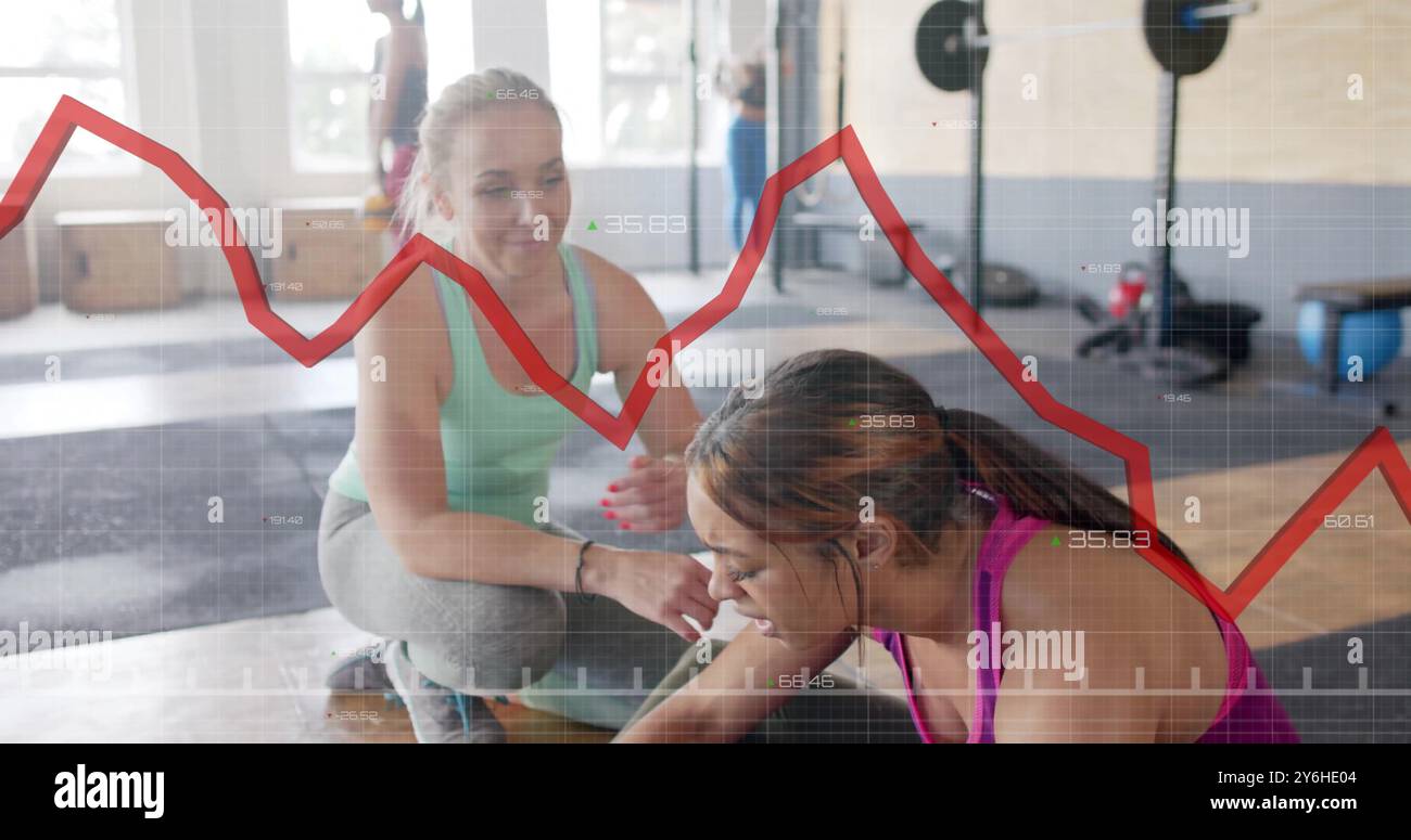 Immagine grafica delle donne che si allenano con la palla fitness in palestra Foto Stock