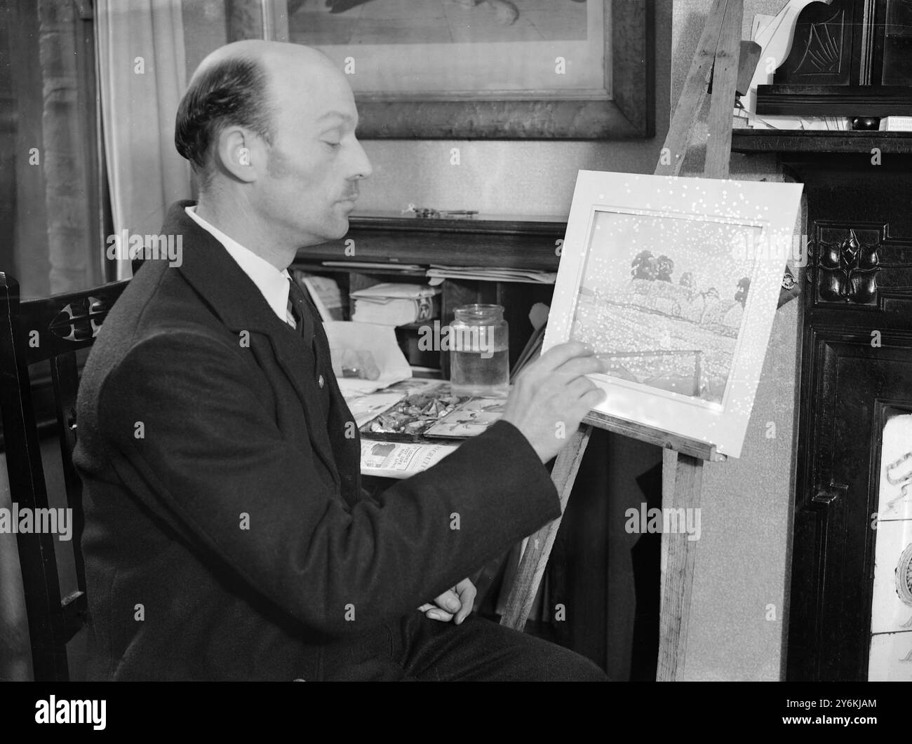 Signor A. Pasmore, il simbolo della London Midland and Scottish Railway - artista, con il dipinto che sta inviando alla Royal Academy di quest'anno. È stato associato al signor L. Burlington Bruhl in una mostra congiunta e ha studiato sotto la guida del signor Bruhl - foto scattata il 4 marzo 1933 © TopFoto Foto Stock