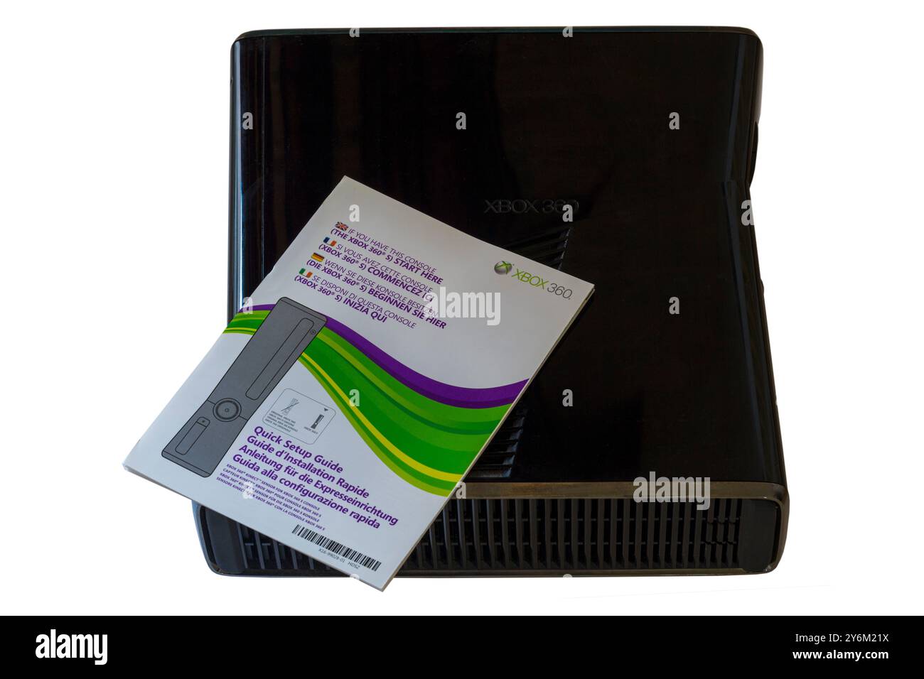 Console Xbox 360 con guida rapida isolata su sfondo bianco Xbox360 Foto Stock