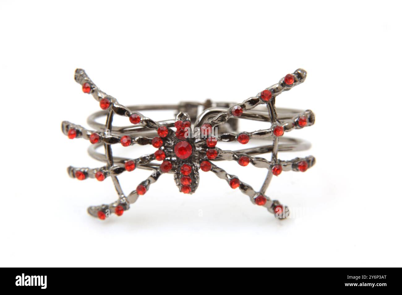 Bracciale ragno in costume di Halloween con diamanti rossi Foto Stock