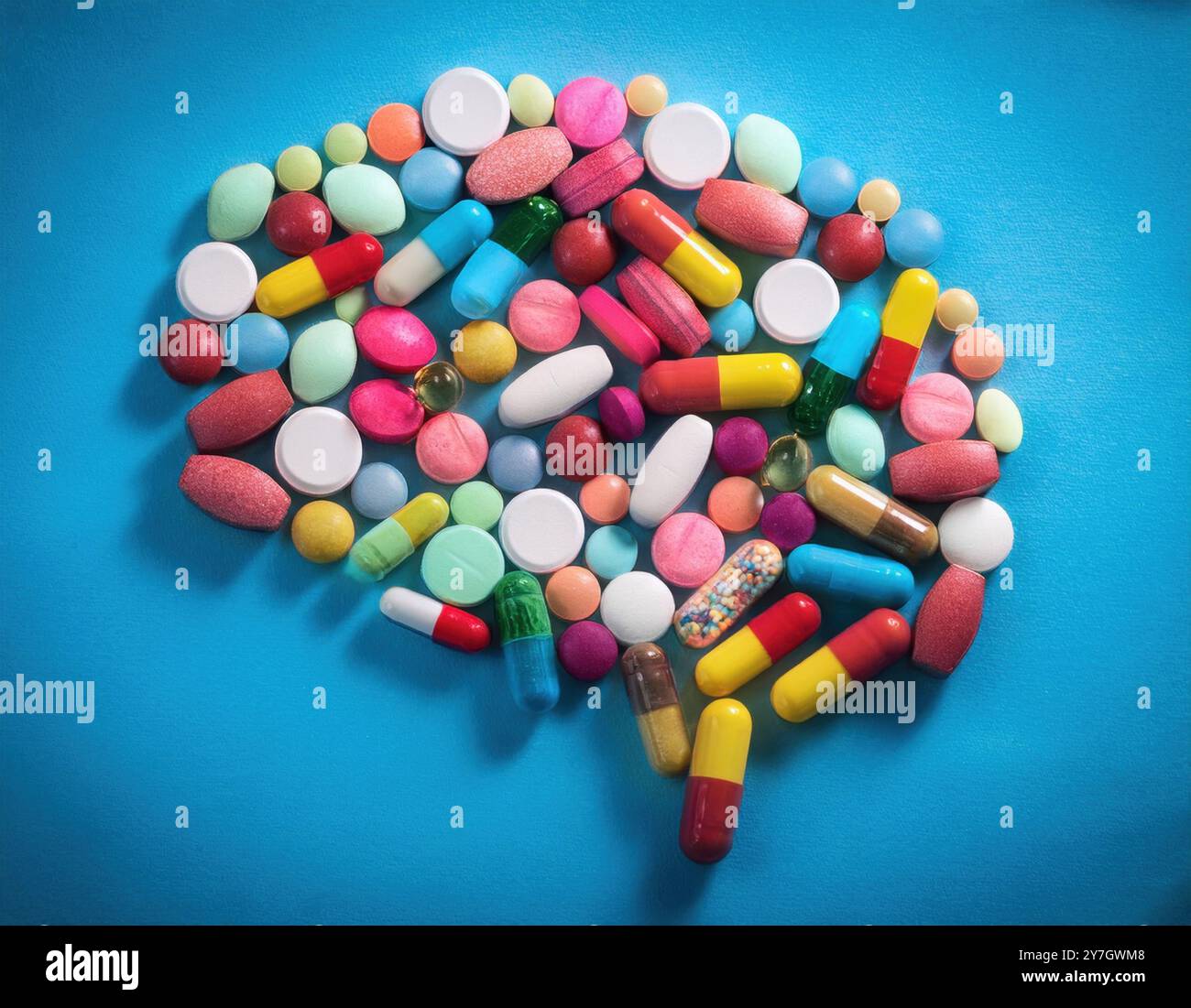 Un assortimento di varie pillole e capsule, che rappresentano la complessità e la varietà di farmaci utilizzati nella guarigione mentale Foto Stock