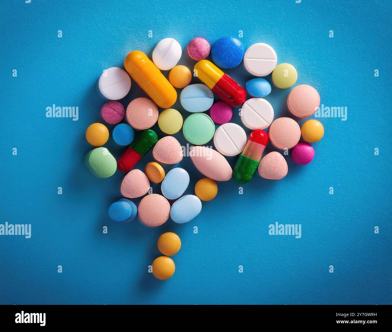 Un assortimento di varie pillole e capsule, che rappresentano la complessità e la varietà di farmaci utilizzati nella guarigione mentale Foto Stock