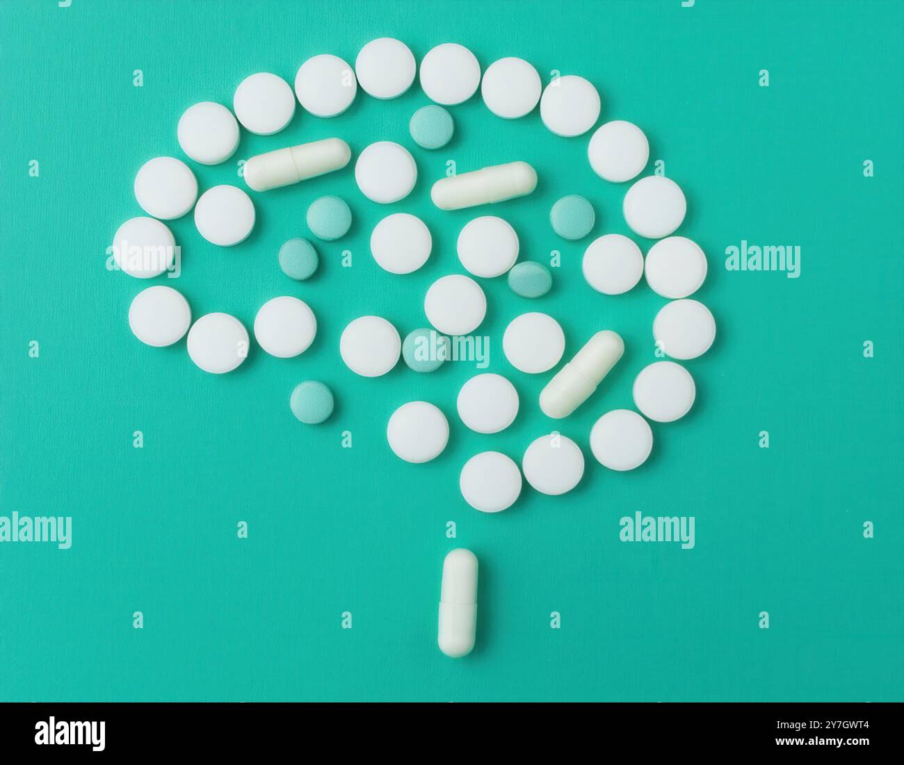 Un assortimento di varie pillole e capsule, che rappresentano la complessità e la varietà di farmaci utilizzati nella guarigione mentale Foto Stock