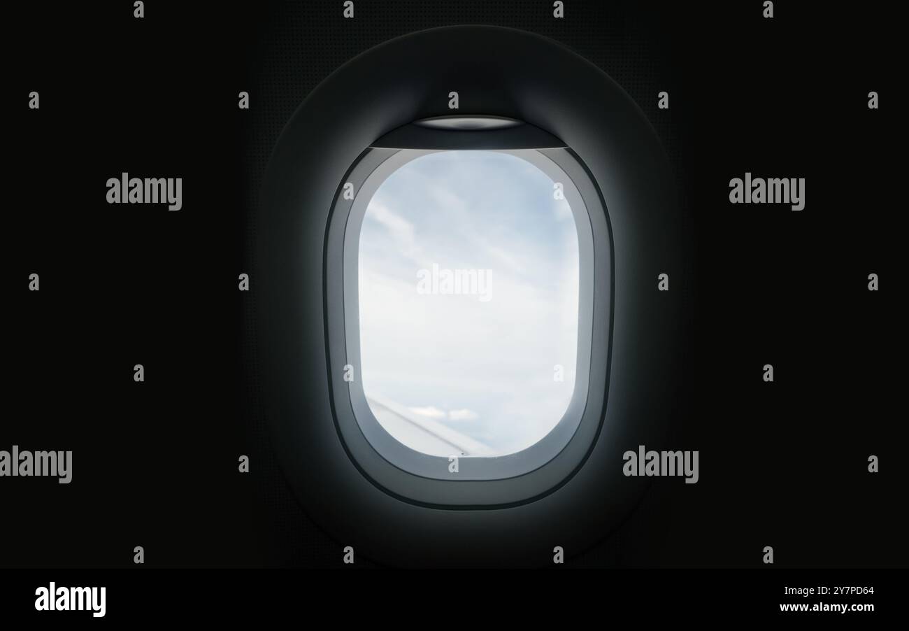 Fissare fuori dalla finestra Di Una cabina dell'aereo. Concetto di vacanza e viaggio Foto Stock